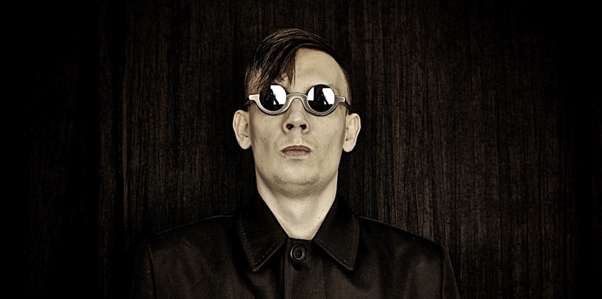Portrait photo of Paweł Wilk, stylized