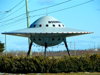 The photograph shows a UFO mock-up